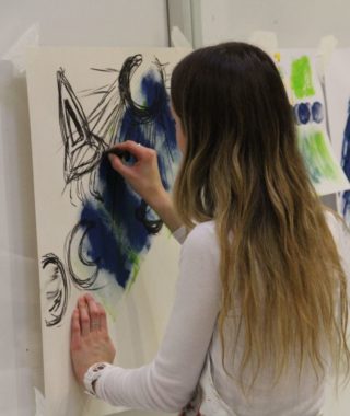 student painting at the Sainsbury Centre