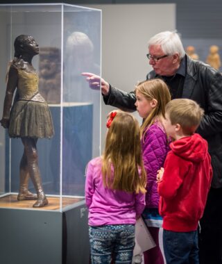 Children enjoying a guided tour of the collection with a volunteer guide. Photo: Andy Crouch