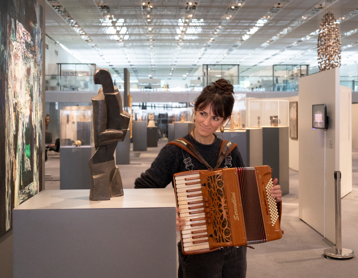 Tamsin Elliot playing the accordion to Ossip Zadkine’s The Accordion Player, 1918, at the Sainsbury Centre as part of the SoundEscapes project in collaboration with Sound + Music. Photo: Kate Wolstenholme