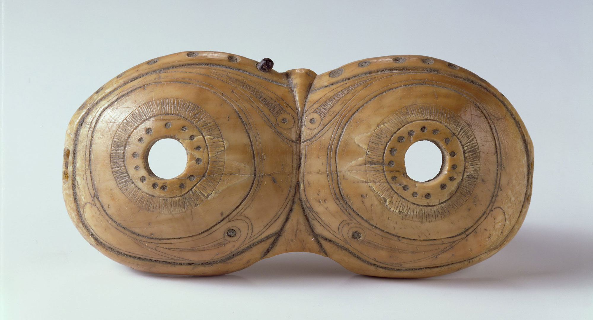 Snow goggles, c400–600AD, made from Walrus ivory, Ipiutak culture, produced in Alaska, possibly in the region of Point Hope, Chukchi Sea